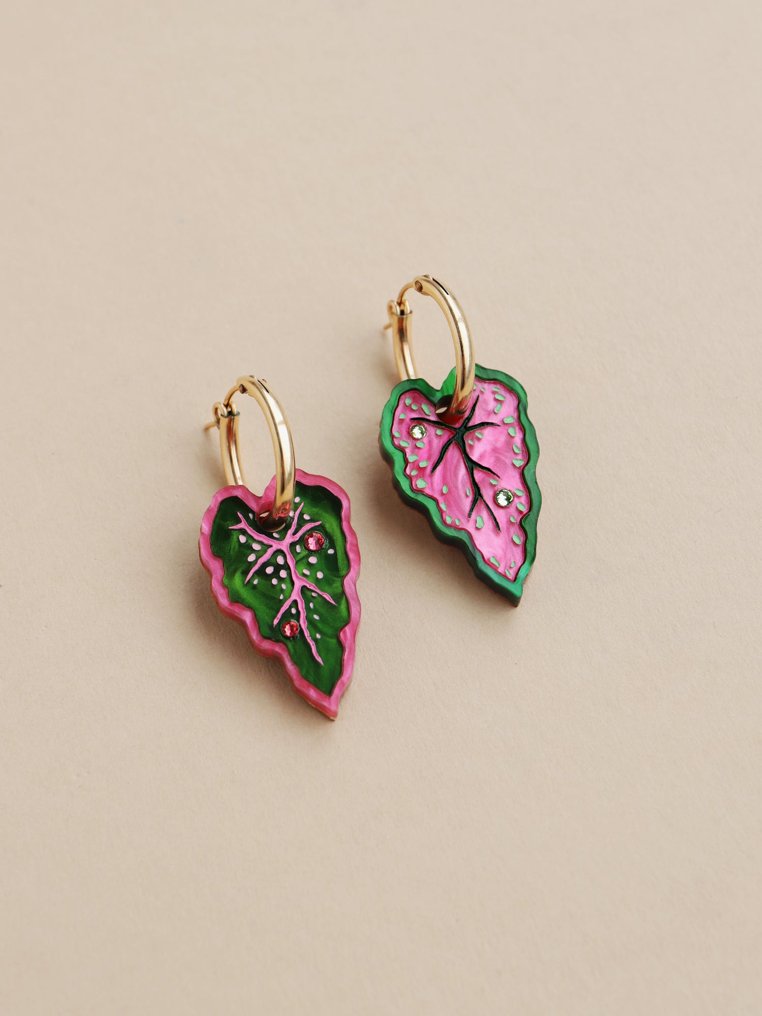 Heart-shaped caladium leaf hoop earrings. A design collaboration with L.O.M, a colourful party-wear brand. Handmade in the UK by Wolf & Moon.