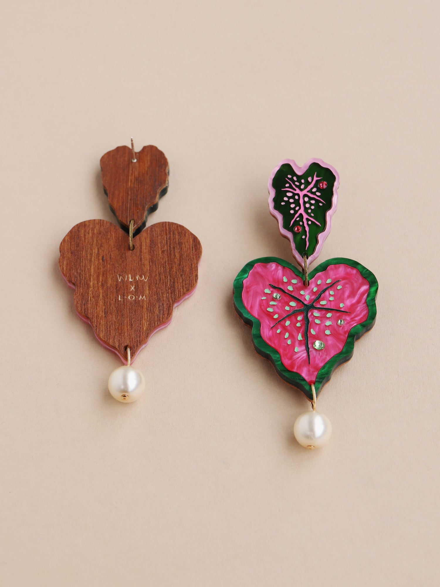  Heart-shaped caladium leaf statement earrings. A design collaboration with L.O.M, a colourful party-wear brand. Handmade in the UK by Wolf & Moon.