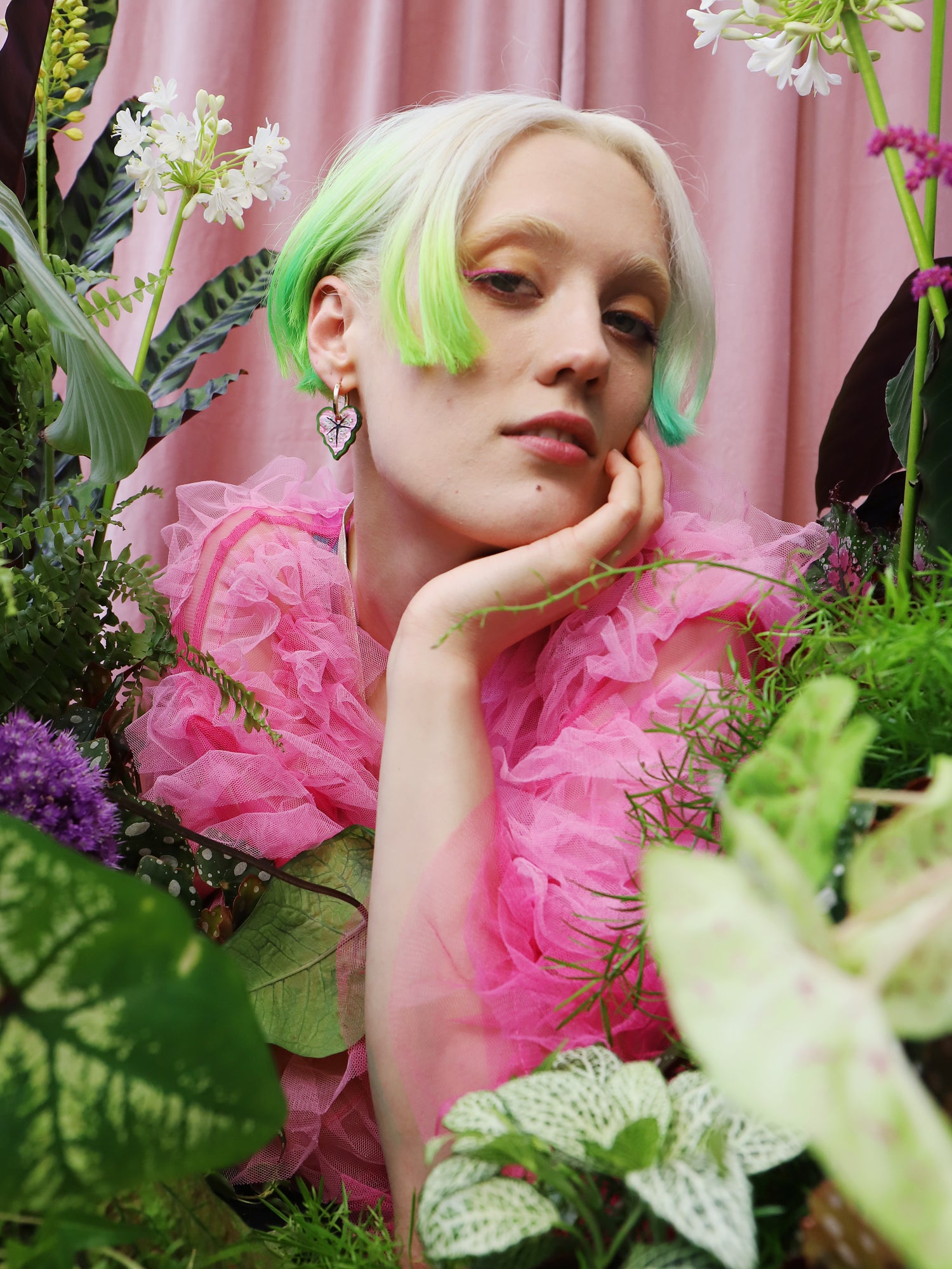 Heart-shaped caladium leaf hoop earrings. A design collaboration with L.O.M, a colourful party-wear brand. Handmade in the UK by Wolf & Moon.