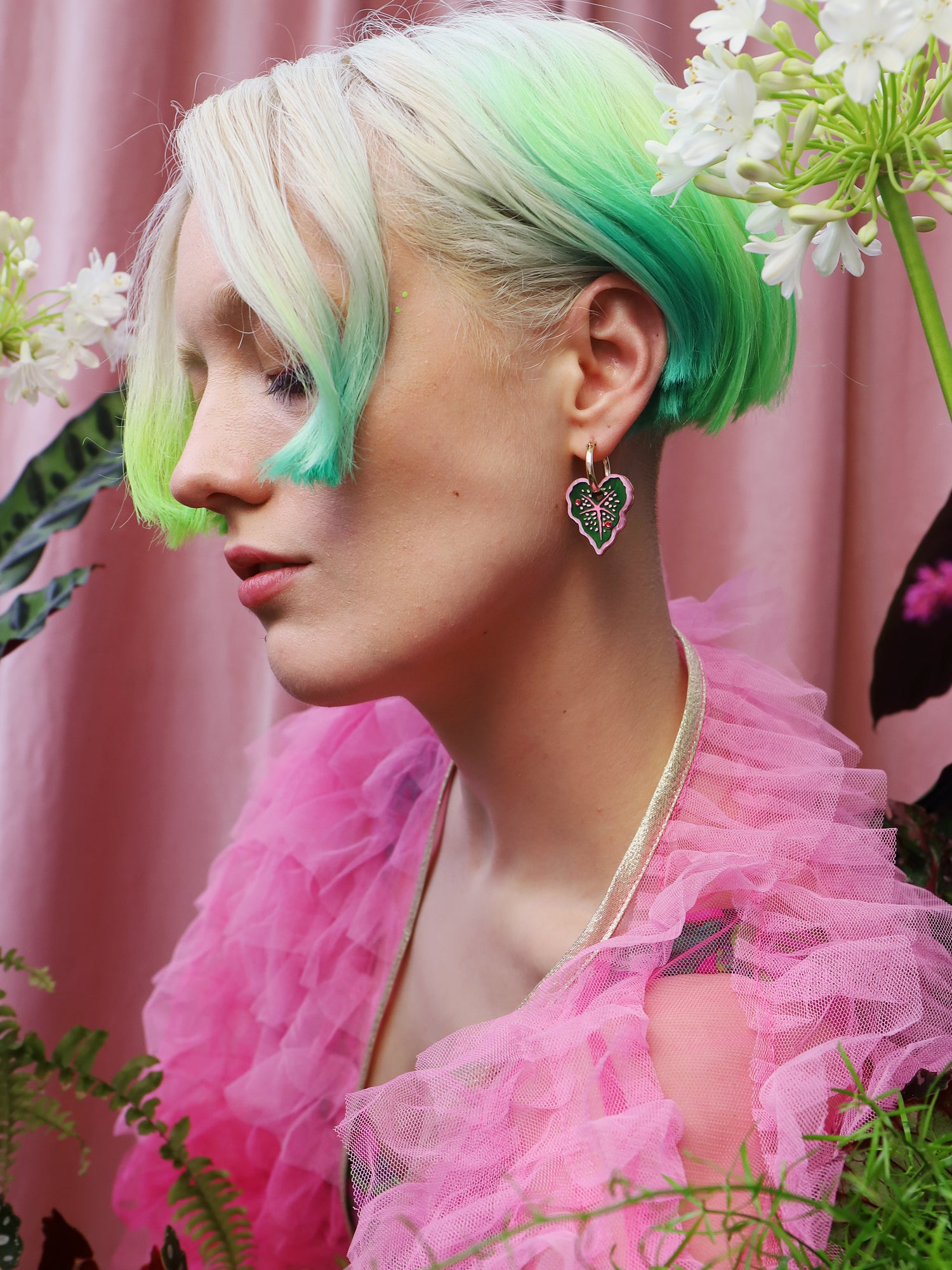 Heart-shaped caladium leaf hoop earrings. A design collaboration with L.O.M, a colourful party-wear brand. Handmade in the UK by Wolf & Moon.