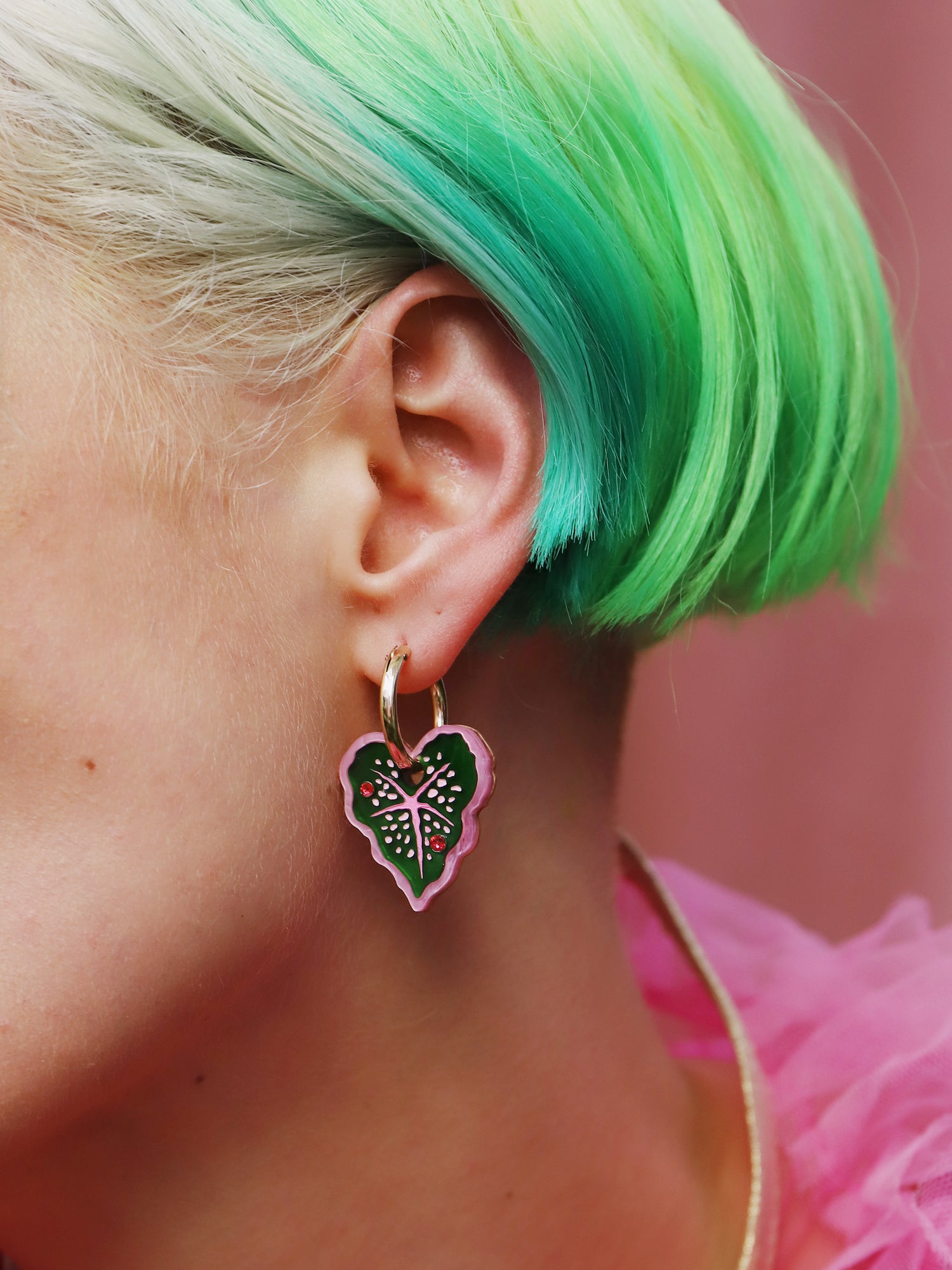 Heart-shaped caladium leaf hoop earrings. A design collaboration with L.O.M, a colourful party-wear brand. Handmade in the UK by Wolf & Moon.