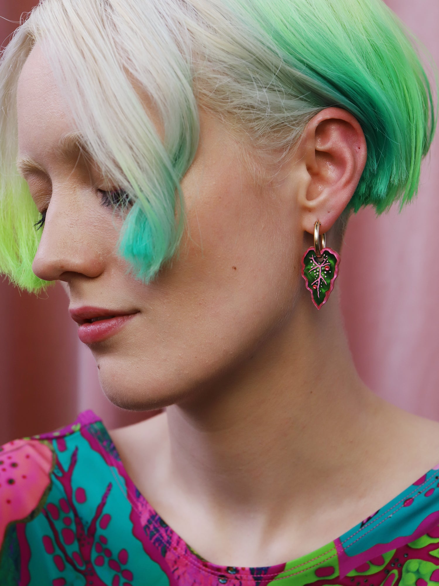 Heart-shaped caladium leaf hoop earrings. A design collaboration with L.O.M, a colourful party-wear brand. Handmade in the UK by Wolf & Moon.