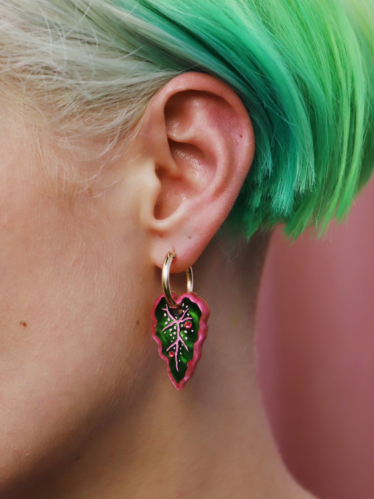 Heart-shaped caladium leaf hoop earrings. A design collaboration with L.O.M, a colourful party-wear brand. Handmade in the UK by Wolf & Moon.