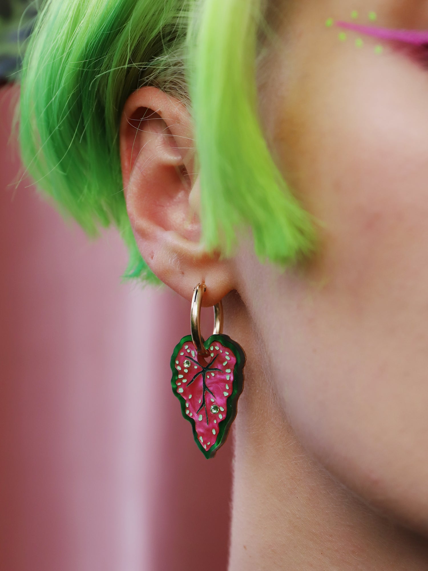 Heart-shaped caladium leaf hoop earrings. A design collaboration with L.O.M, a colourful party-wear brand. Handmade in the UK by Wolf & Moon.