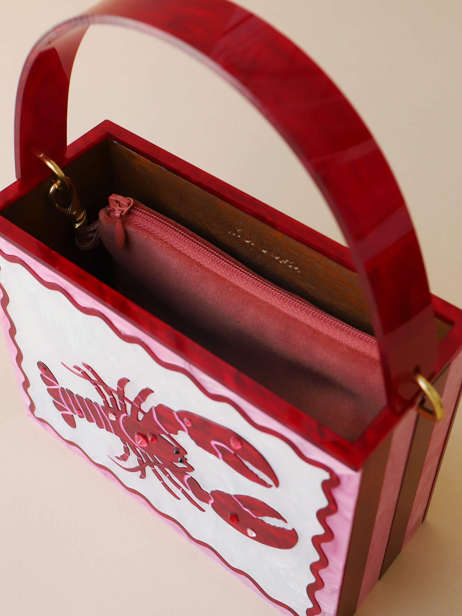 Red & pink lobster bag. Made from acrylic and wood. Handmade in the UK by Wolf & Moon. 