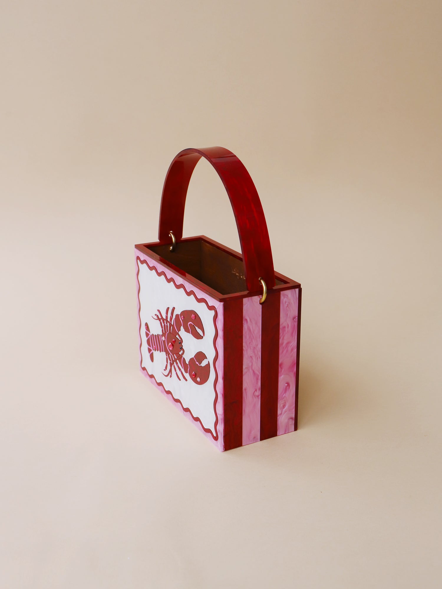 Red & pink lobster bag. Made from acrylic and wood. Handmade in the UK by Wolf & Moon. 