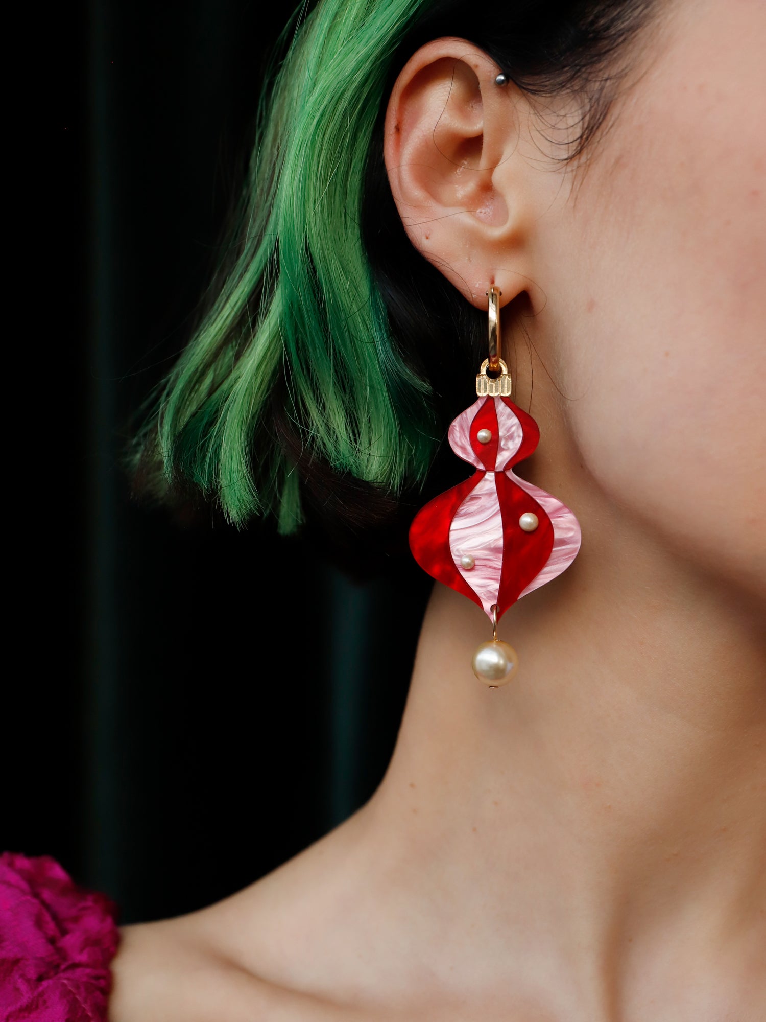 Vintage-inspired bauble statement hoops made from red and pink marbled acrylic with gold mirror details. Wear with our gold-filled hoops. Handmade in London by Wolf & Moon.